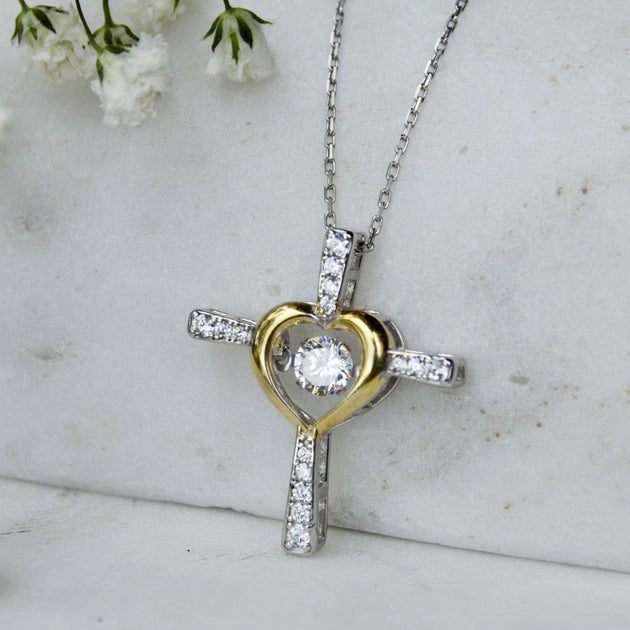 Dancing diamond deals cross necklace